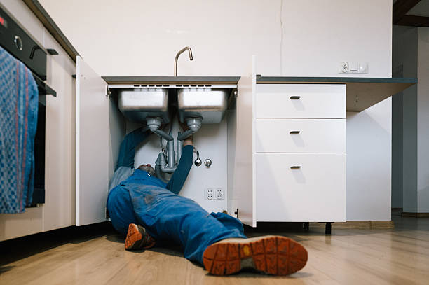 Professional Emergency Plumber technician working in Greenbelt, MD